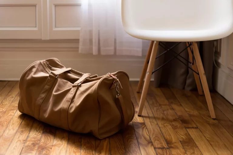 Suitcase on the floor with a paj suitcase tracker