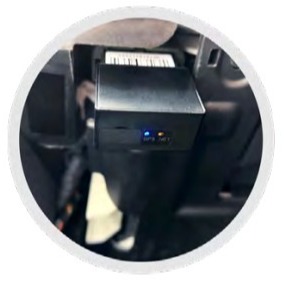 CAR OBD FInder connected to the OBD port of a vehicle